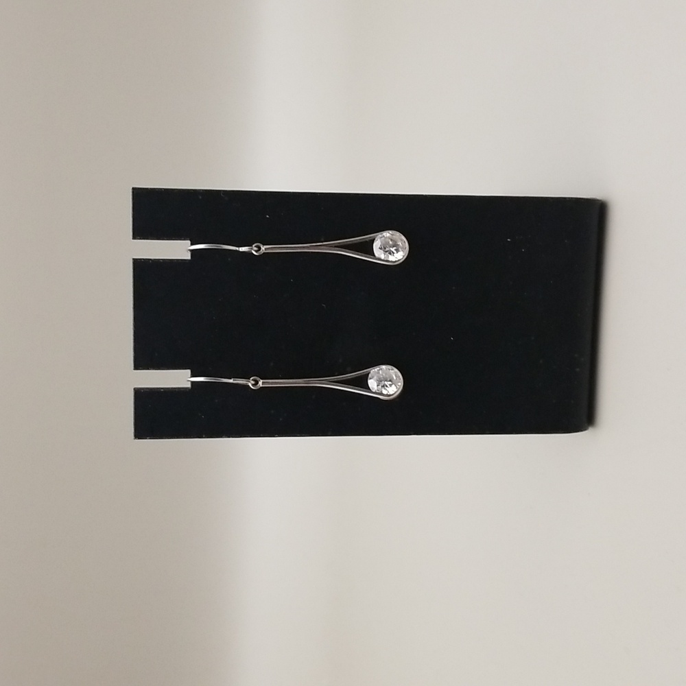 Beautiful silver and cubic zirconia dangle earrings.